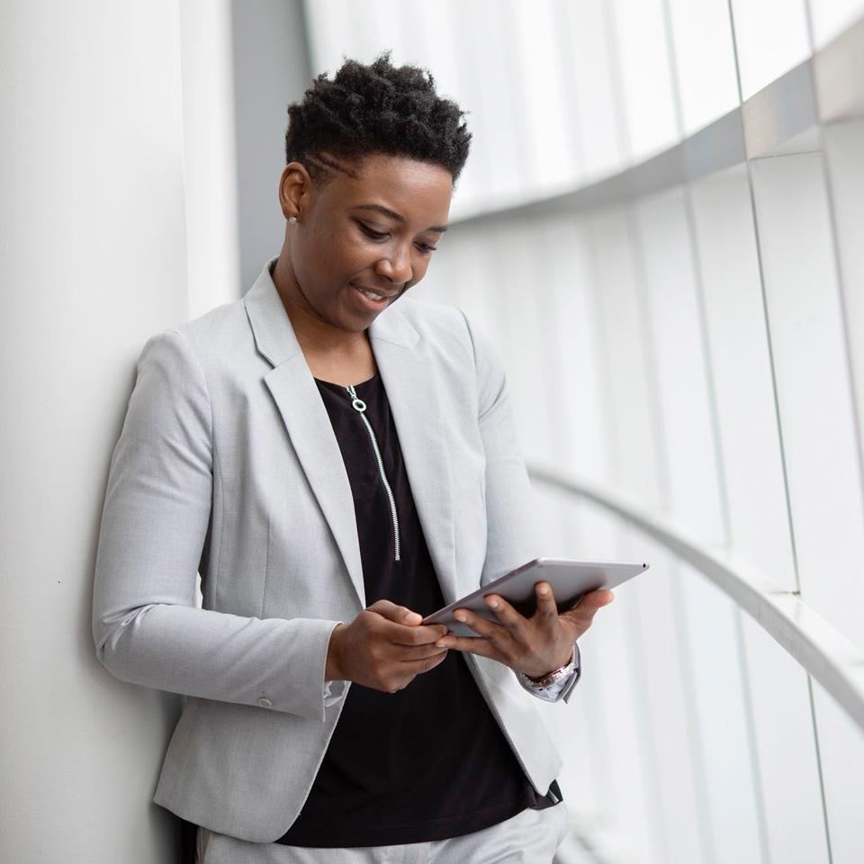 a woman at work with a tablet